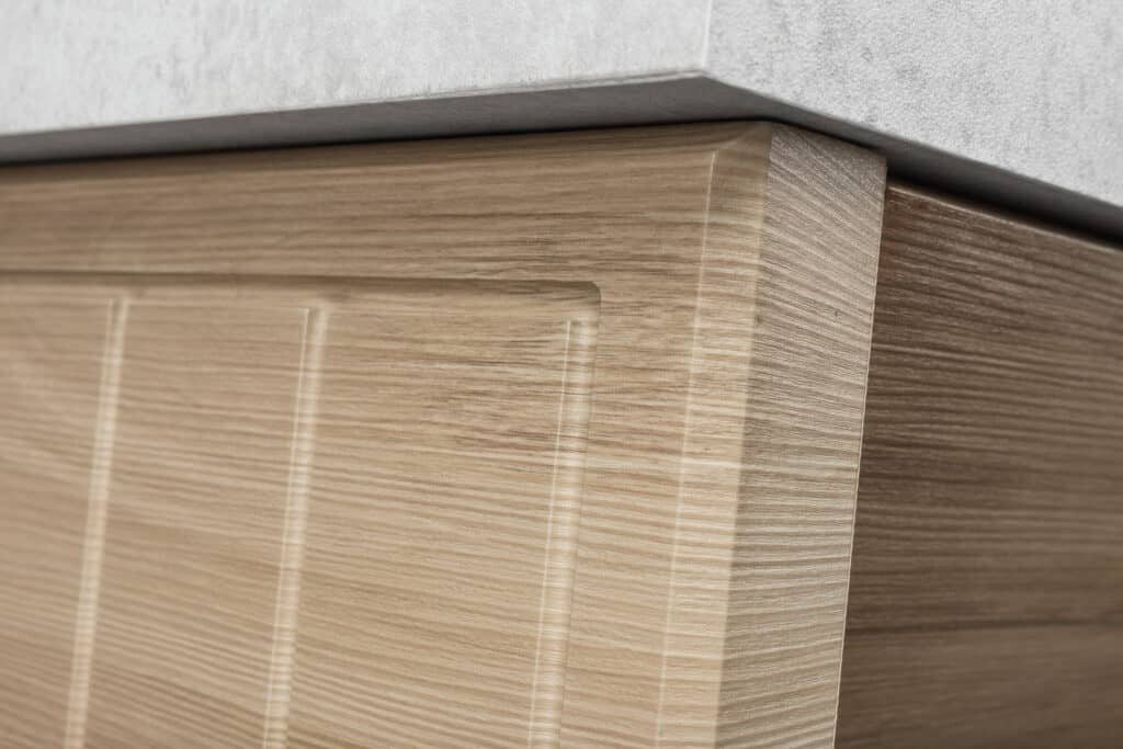 3D laminates that can be pressed over edges, into shapes and intricate details machined into MDF panels.