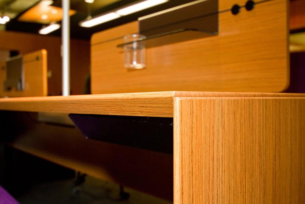 Decorative foils are flat laminated to the work surface, and profiled around the edges of this Fantoni desk. Photo: Material Intelligence
