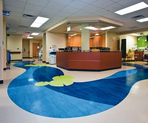 A photo of a lobby with colorful rubber flooring