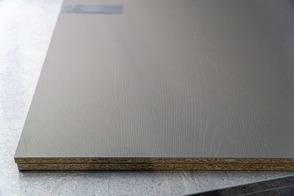 Solid color TFL with woodgrain texture from Egger