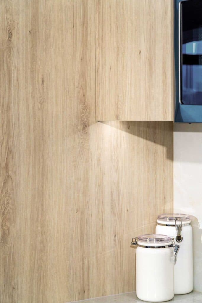 A close up of the kitchen cabinets