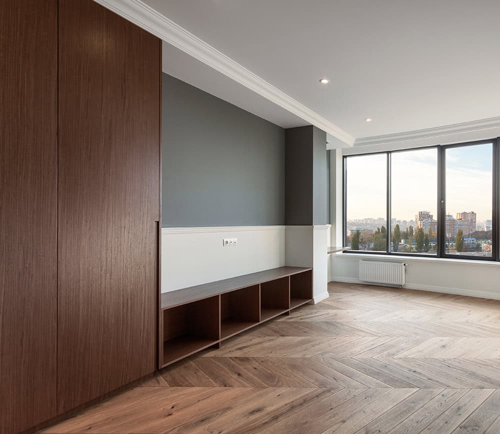 Room with vinyl siding and flooring