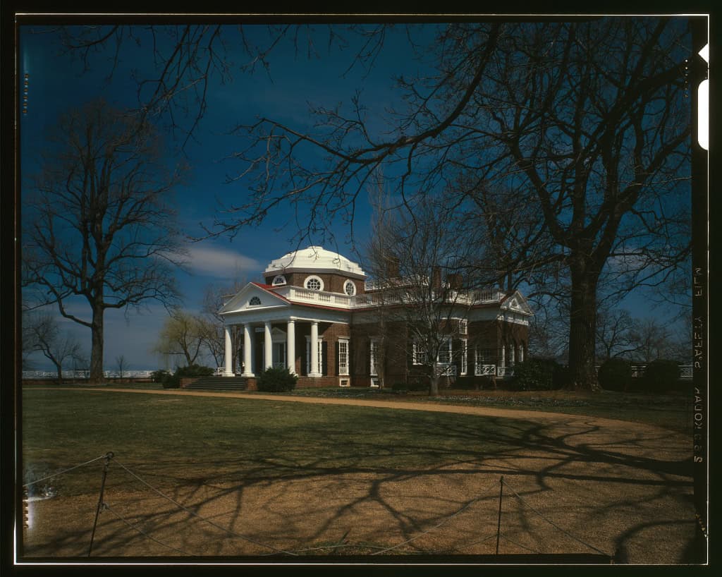 Monticello, Thomas Jefferson’s domed brick home in Virginia, seen from the southwest through bare trees